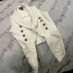 Wet seal cute vest it goes almost with everything